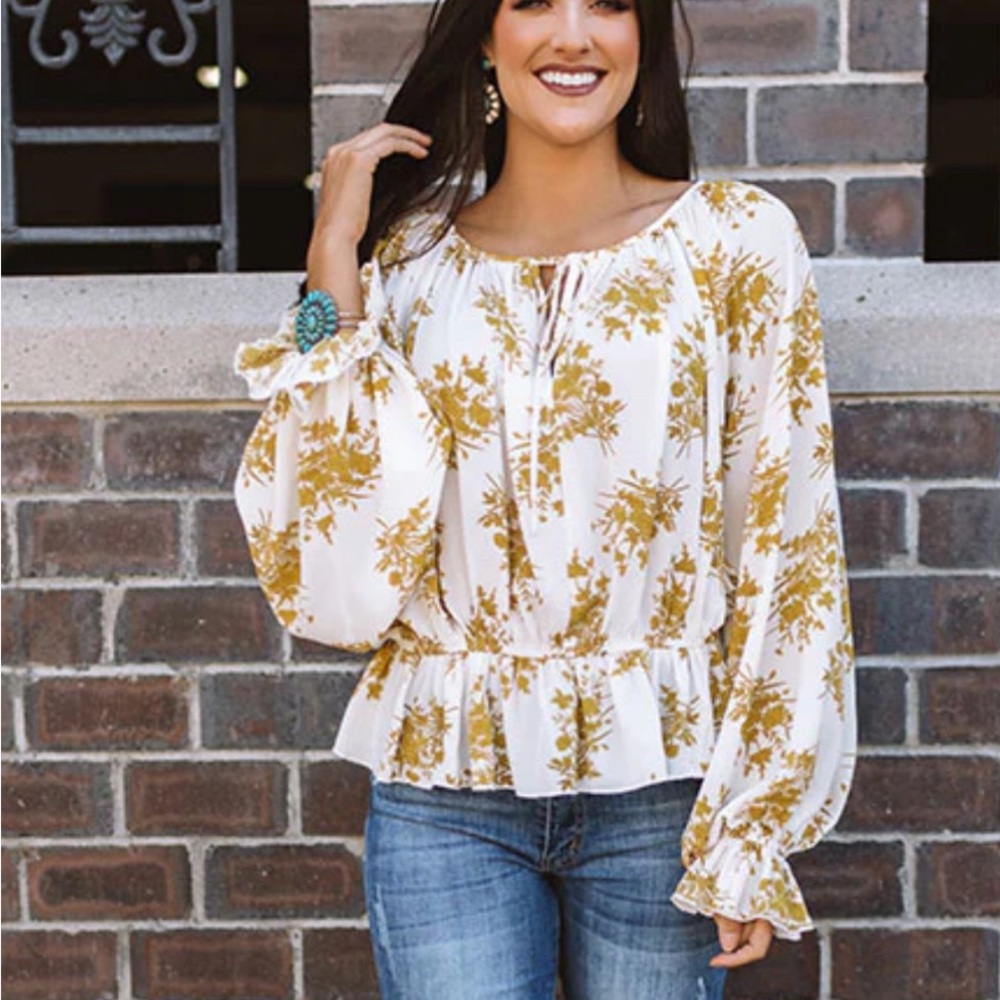 Pretty light semi sheer blouse with peplum ruffle